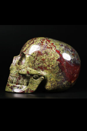 Drakenbloedsteen 'Mitchell Hedges' realistische kristallen schedel, 12.5 cm, x kg